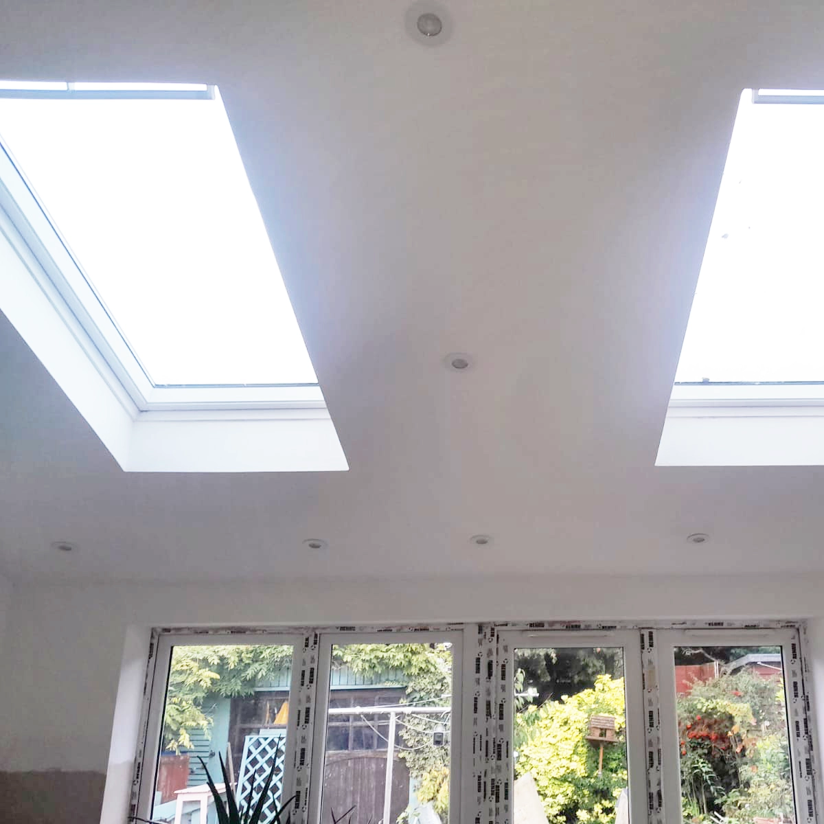 plastered and painted ceiling with roof windows