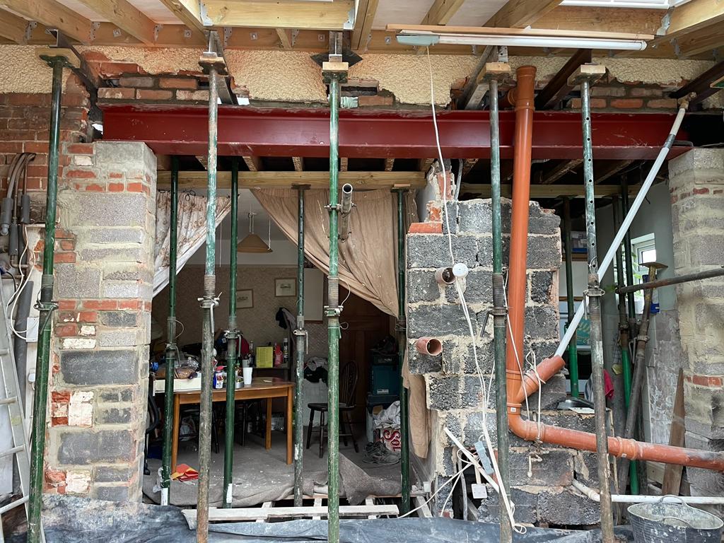 steel beam supportin a ceiling during construction of a semi-detached house kitchen extension