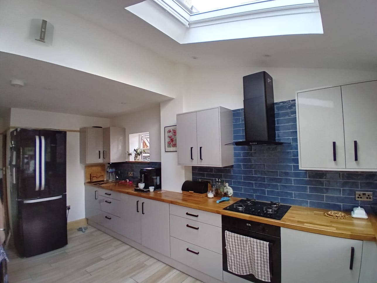 New kitchen in a new extension with new tiling, floors, walls and furniture in Southampton